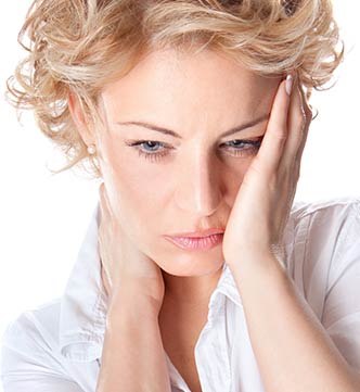 Kopf- und Nackenschmerzen können ihre Ursache im Kieferbereich haben